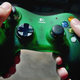We don’t want to get a DMCA takedown notice, so here’s a photo of someone using an almost 20-year-old Logitech controller.